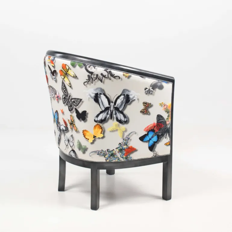 Julien Fauteuil tonneau pour salon fabrication française en tissu et bois massif