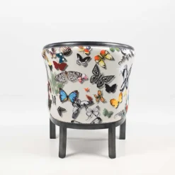 Julien Fauteuil tonneau pour salon fabrication française en tissu et bois massif